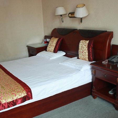 Taizhou Taishan Business Hotel Стая снимка