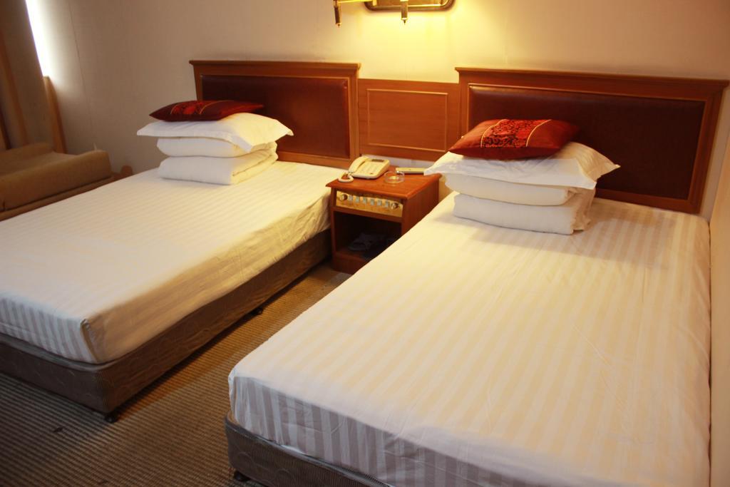 Taizhou Taishan Business Hotel Стая снимка
