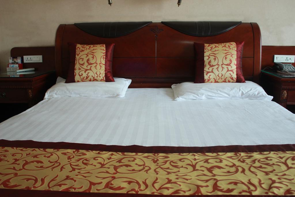 Taizhou Taishan Business Hotel Стая снимка